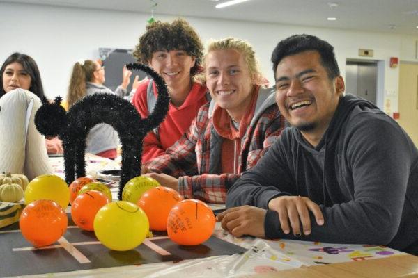 a group of people sitting at a table